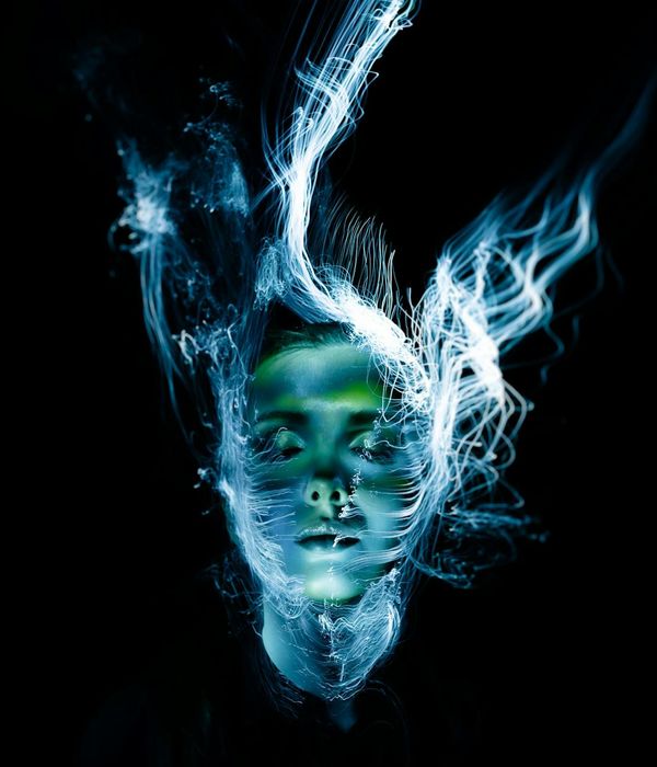 Woman in a dynamic, fluid motion during a light cardio session.